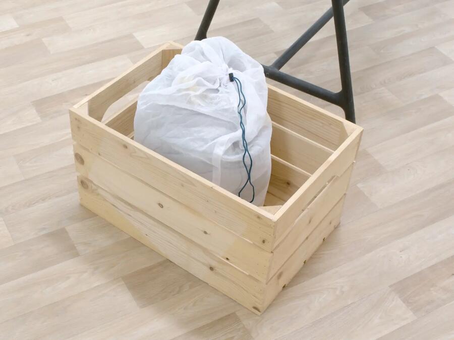 Como guardar um saco-cama?