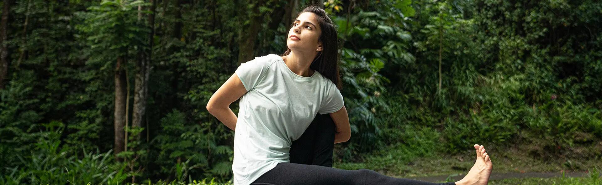 woman doing yoga outdoors