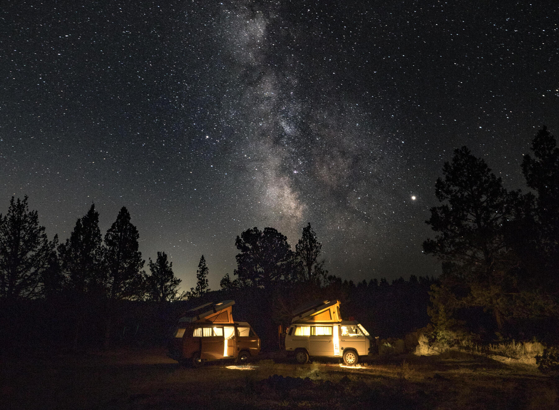 van camp under a starry sky