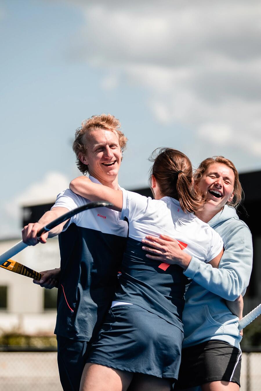 hockey teammates celebrating together