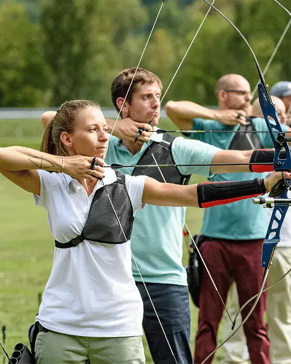 People practicing archery
