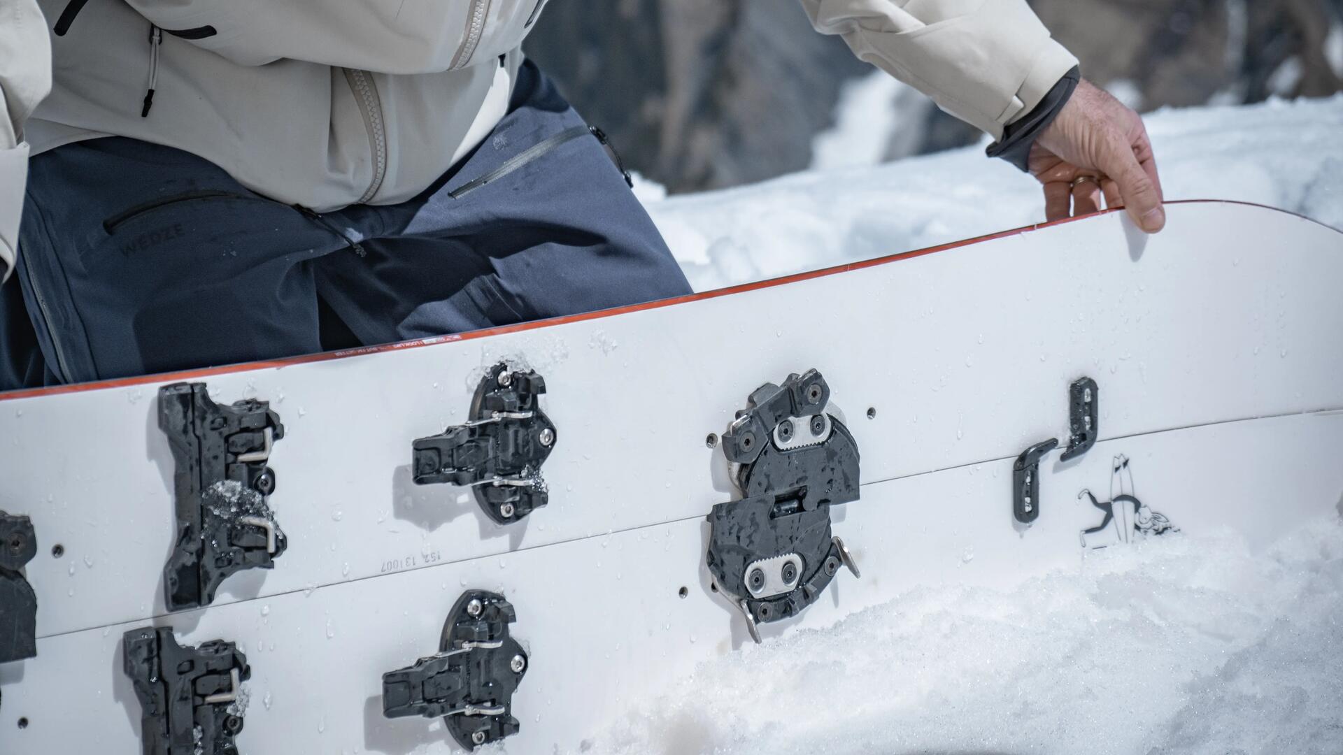 How do you put on and take off your skins when splitboarding?