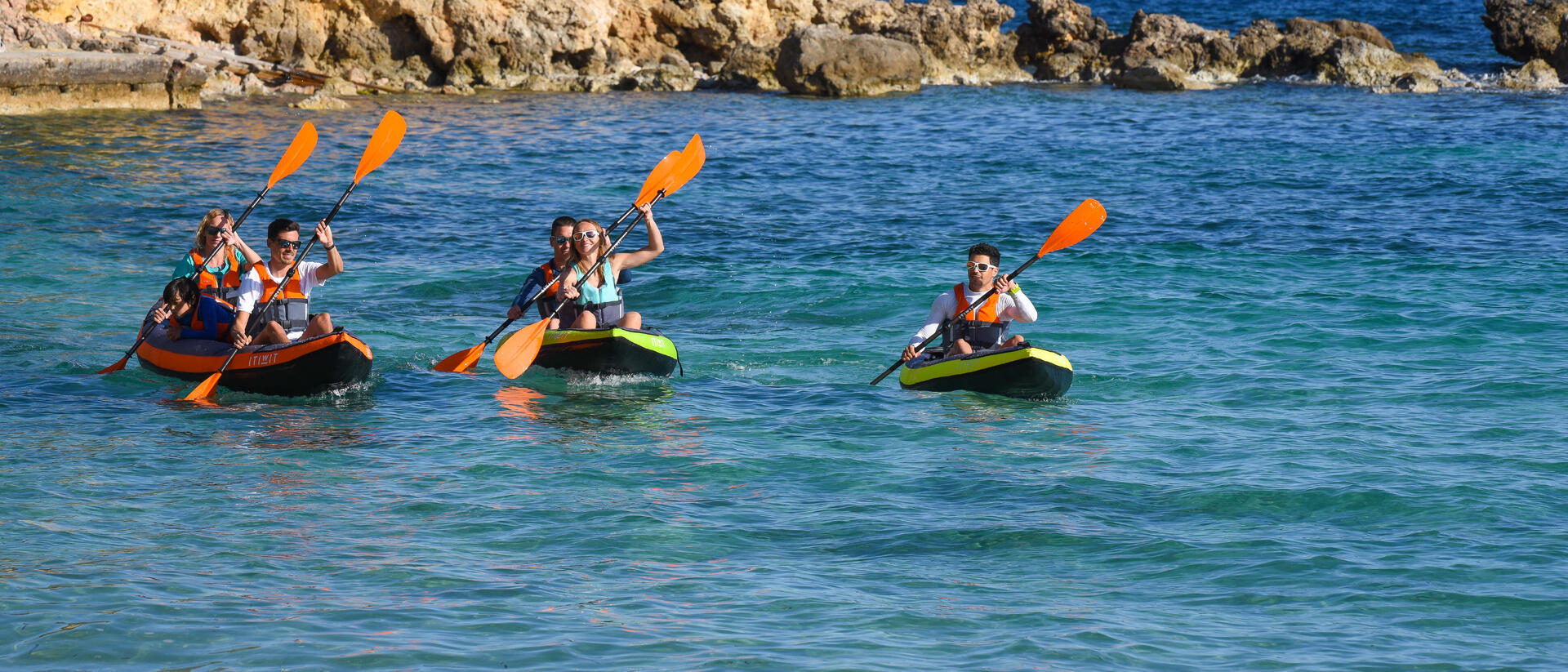 Two people in an inflatable kayak: carry bag and pump included