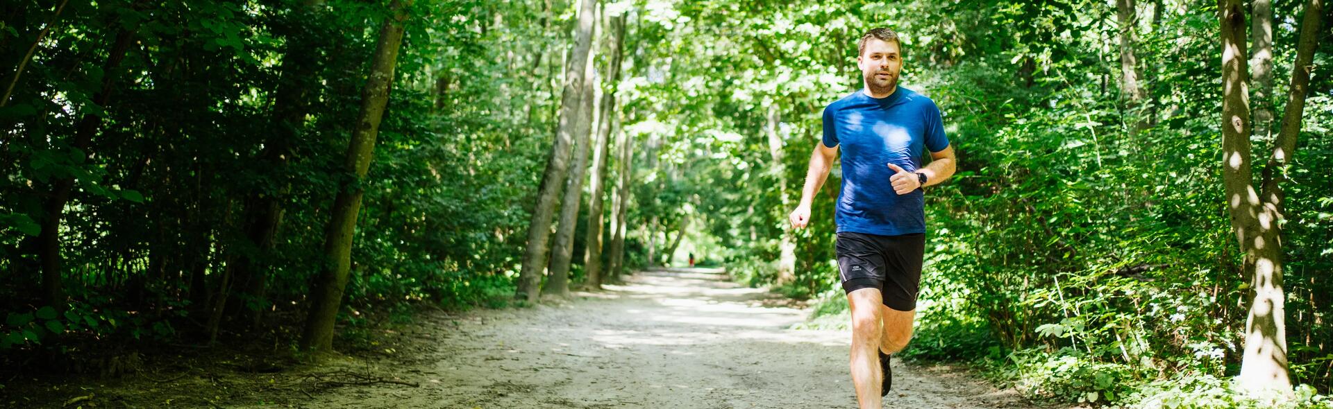 man running in forest