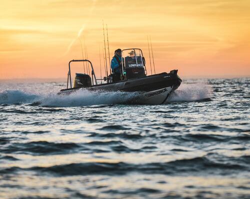 Person fishing from boat