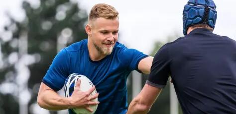 two men playing rugby