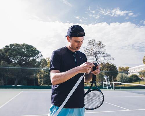 Fitting a tennis racket grip or overgrip