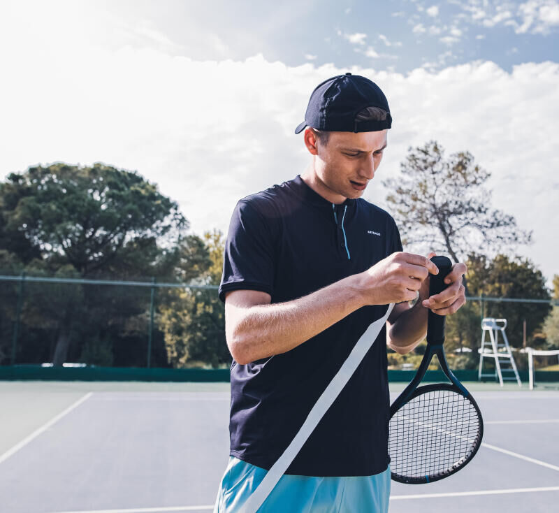 Fitting a tennis racket grip or overgrip