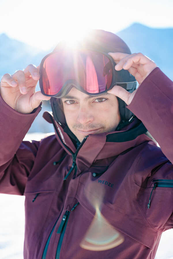 A person wearing a ski helmet