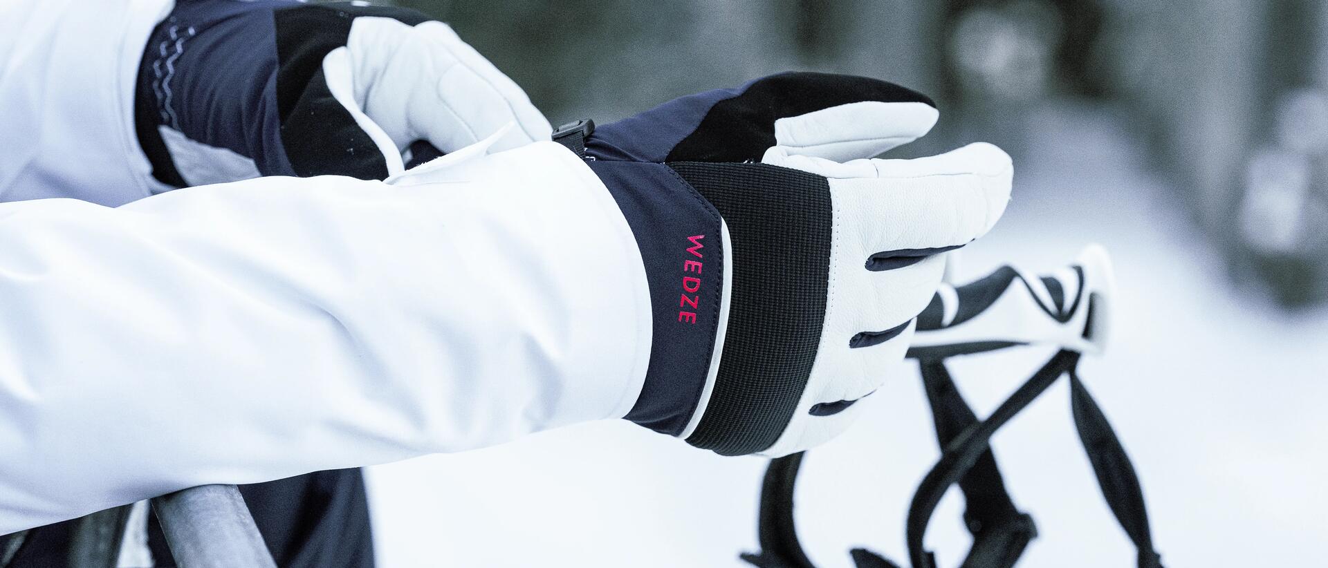 Close-up of man wearing ski gloves