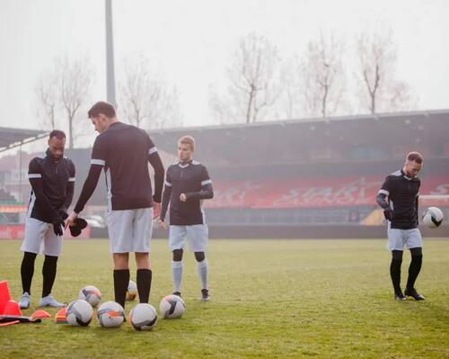 How do you warm up for football properly?