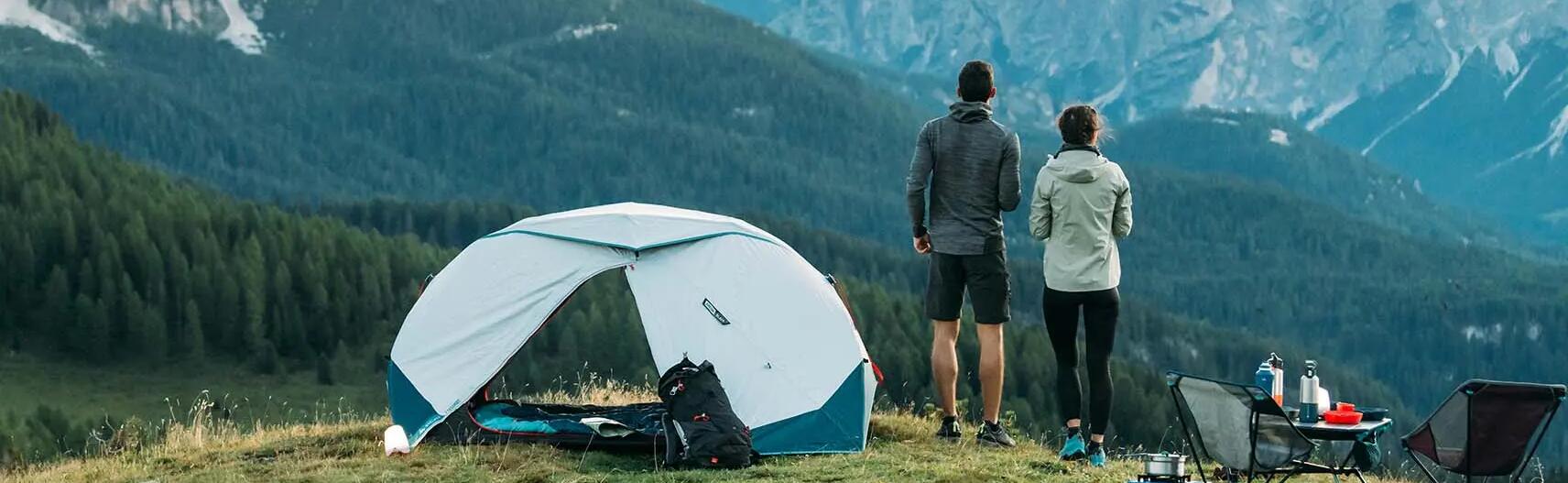 Campers looking out into the mountains