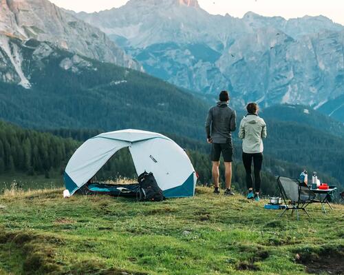 Campers looking out into the mountains