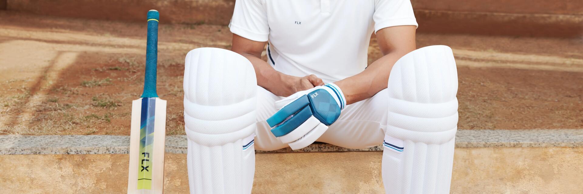 man playing cricket