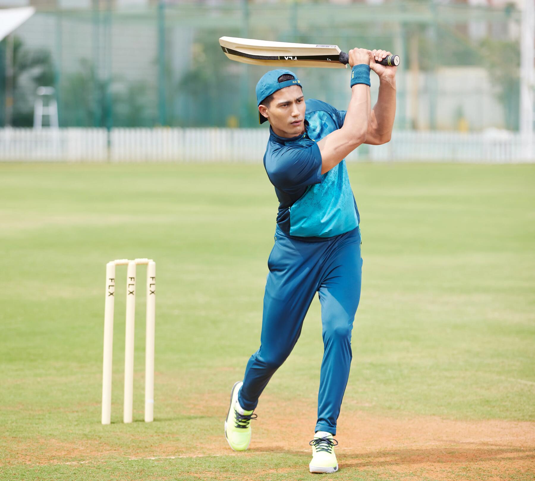Man playing cricket