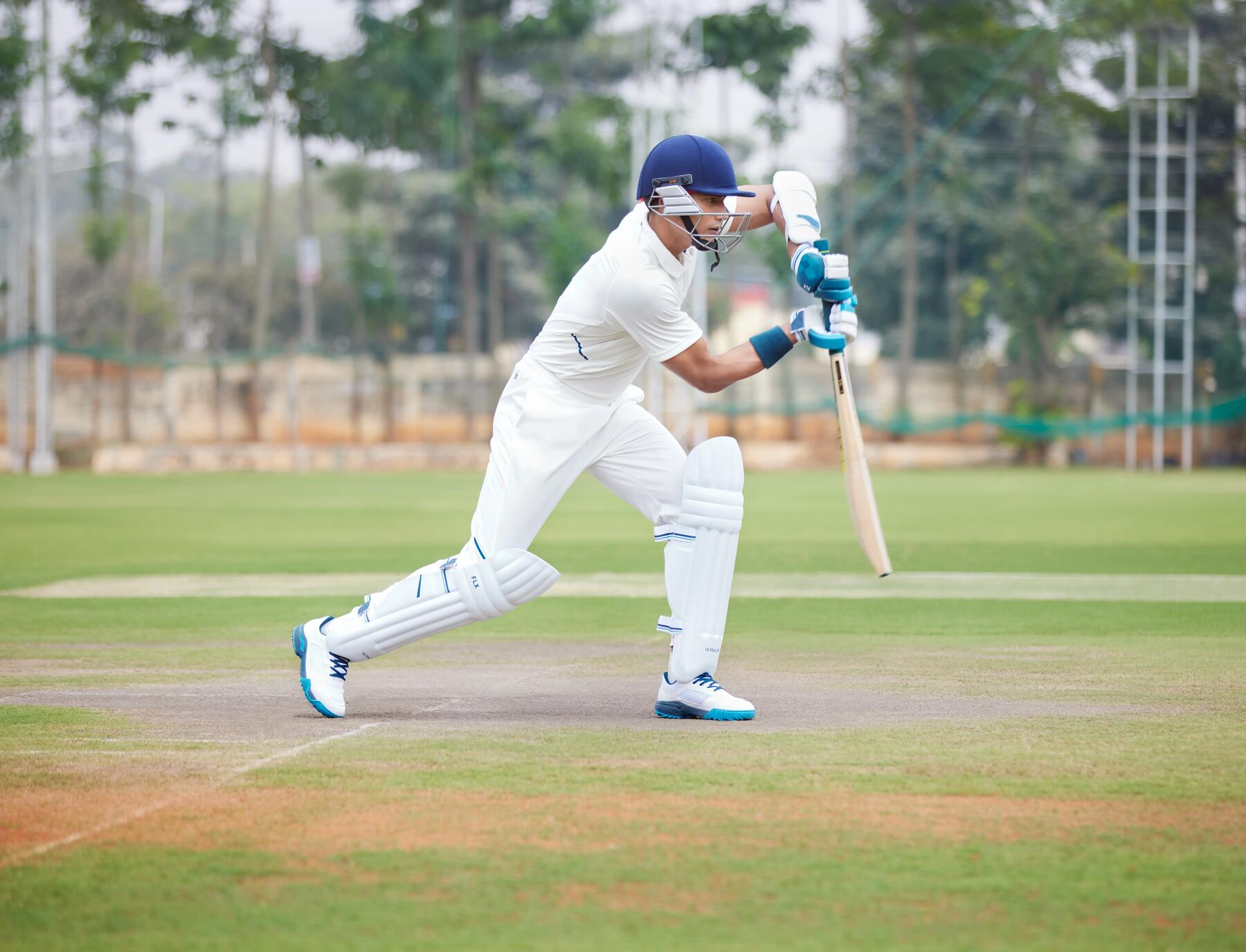 Man playing cricket