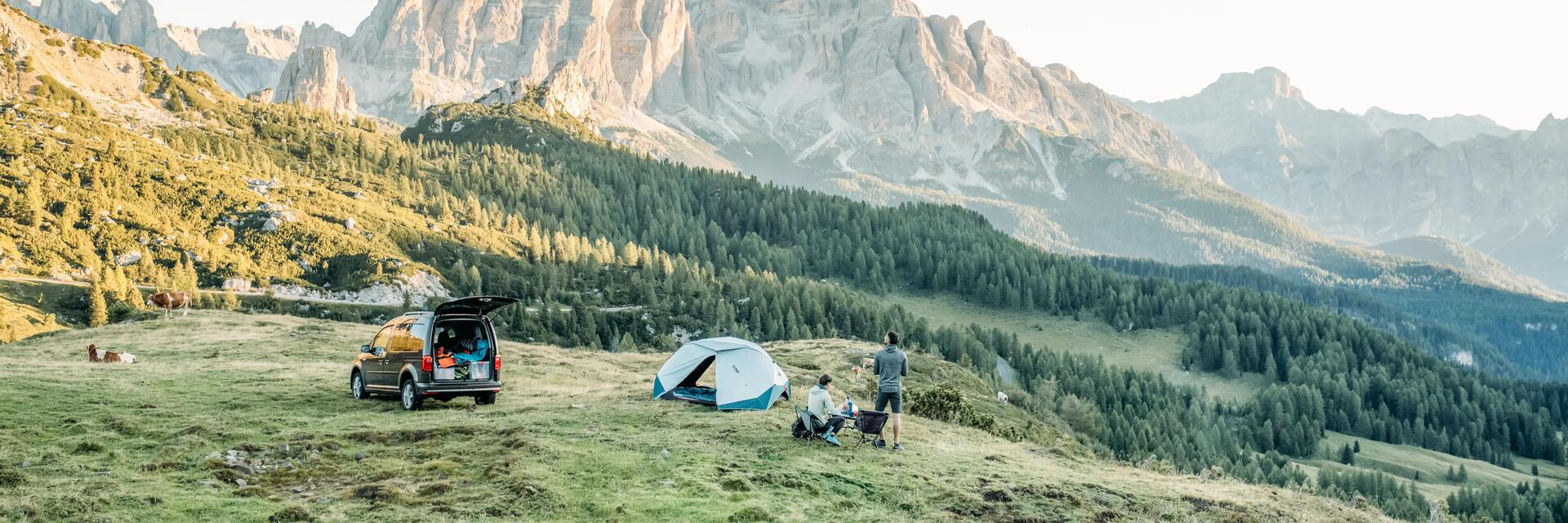 A group of people planning their activities at their campsite