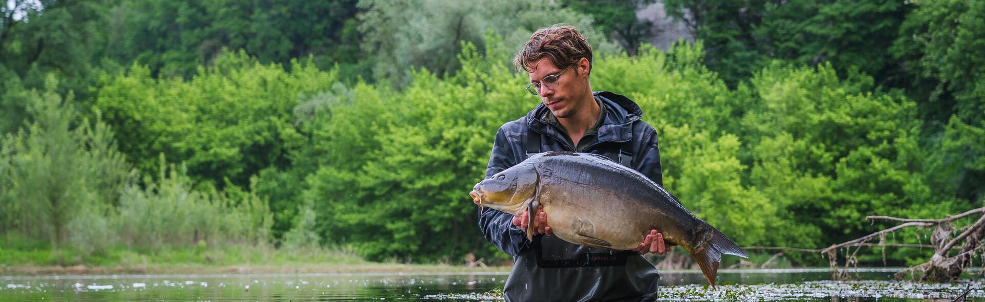 Man holding large carp