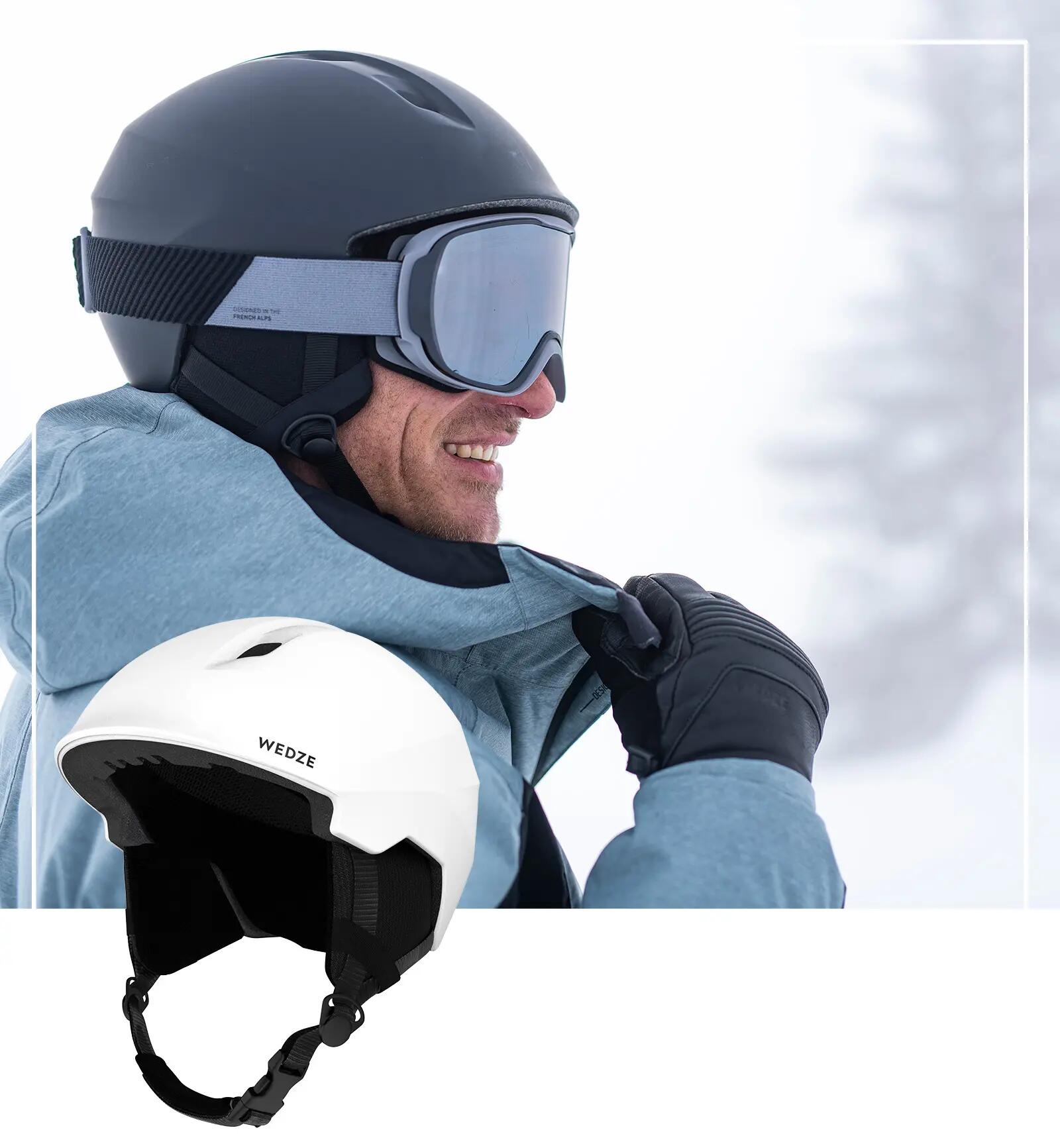 Man wearing  a ski helmet with a visor.