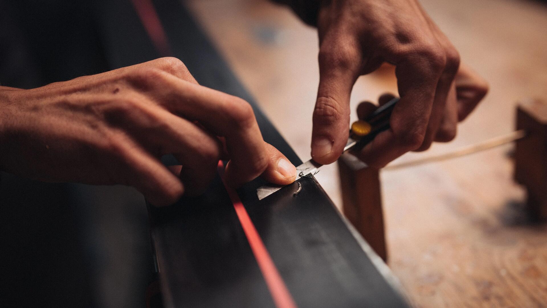 What maintenance should you do to your skis at the end of the season?