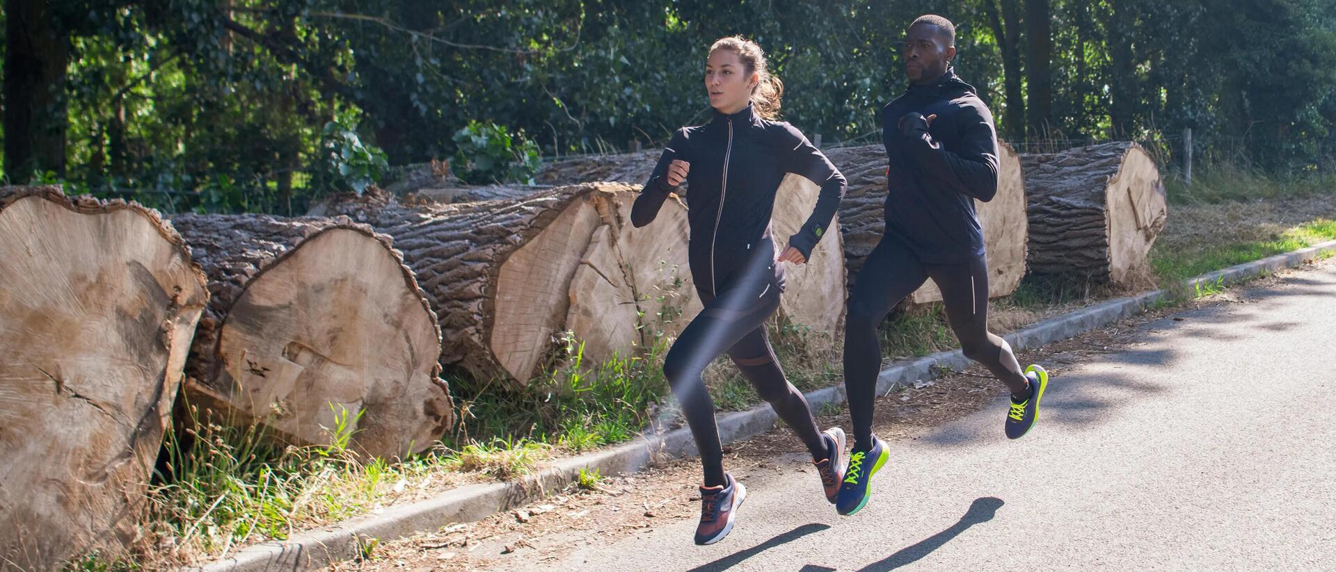 Man and woman running outdoors