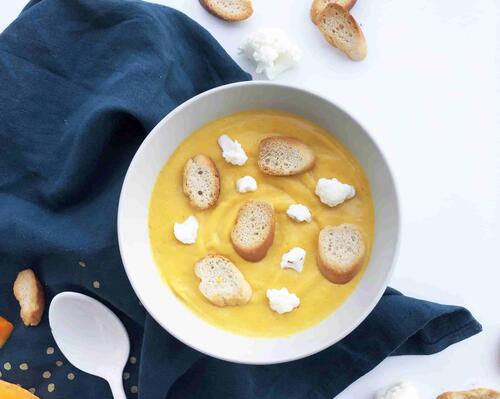 Bowl of soup with croutons and cheese