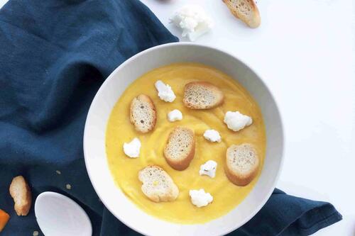 Bowl of soup with croutons and cheese
