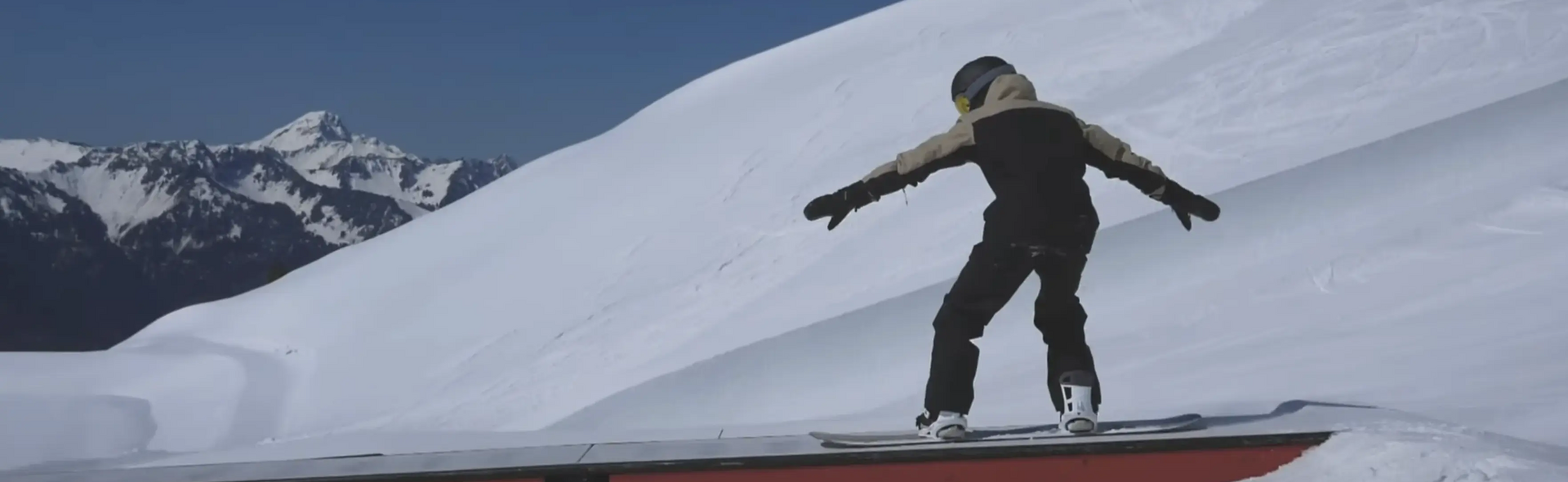 How do you do a 50-50 on a snowboard?