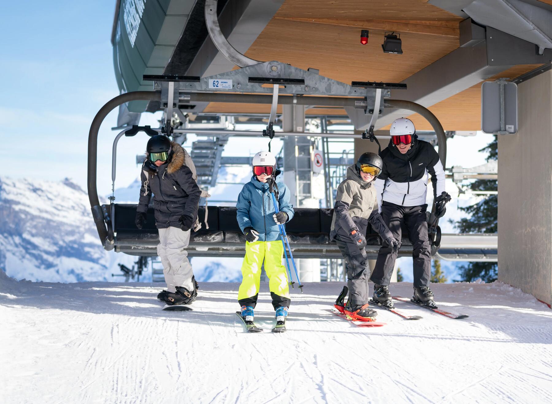 a family on a ski lift