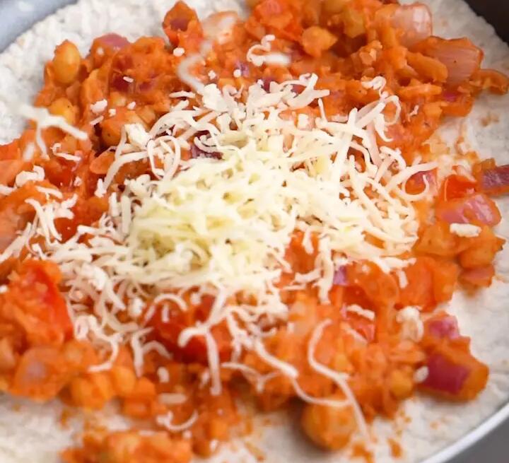 Adding the ingredients and the cheese