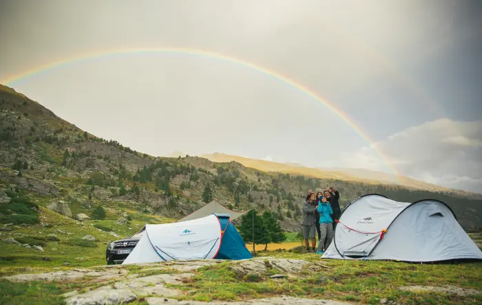 Image of man and tent at night