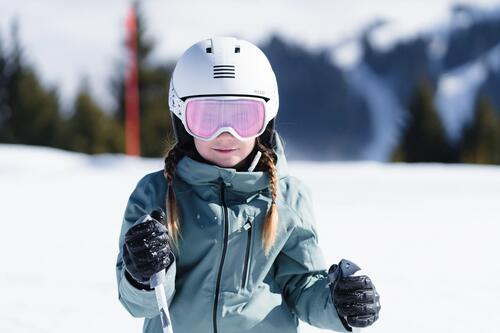 kid skiing with helmet